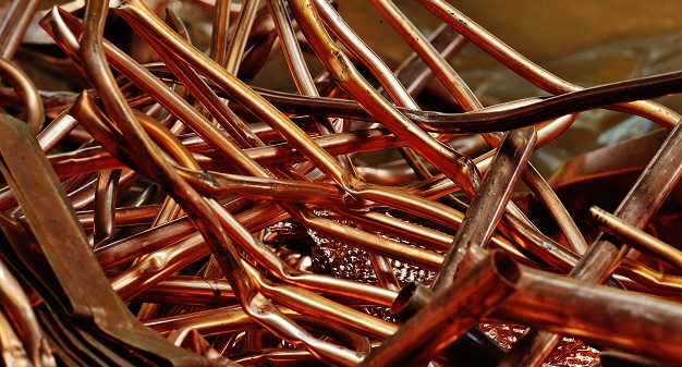 Messy pile of scrap copper pipes
